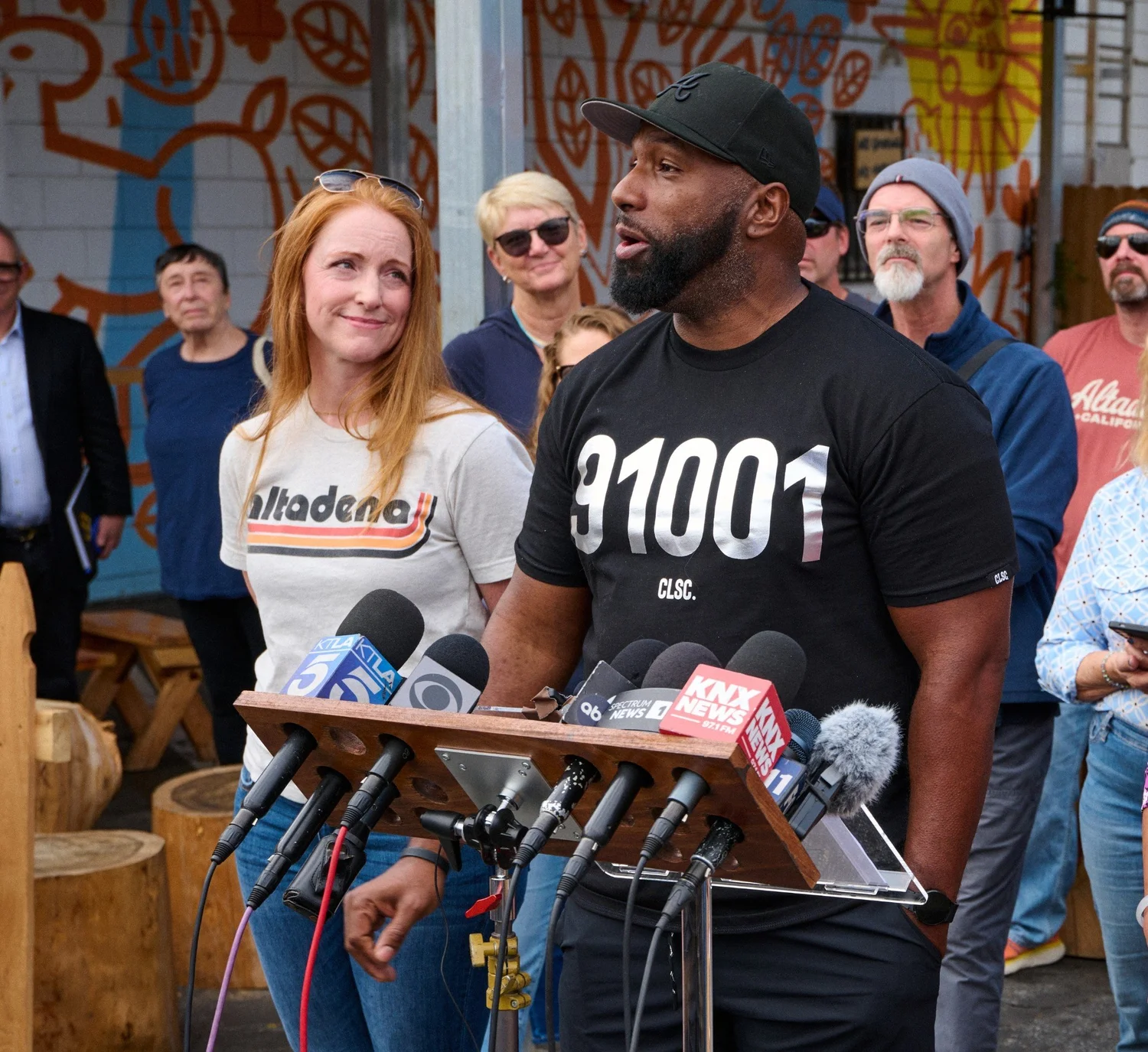 Zaire Calvin of the Eaton Fire Survivors Network speaking at a press conference.
